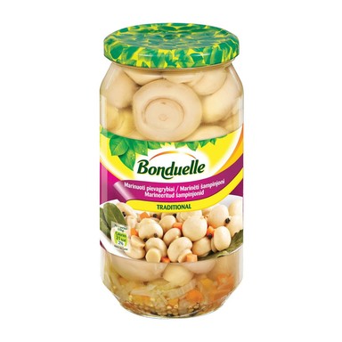 A jar of Bonduelle Traditional Marinated Mushrooms, showing the mushrooms visible through the jar glass, with branding and green accents on the label.