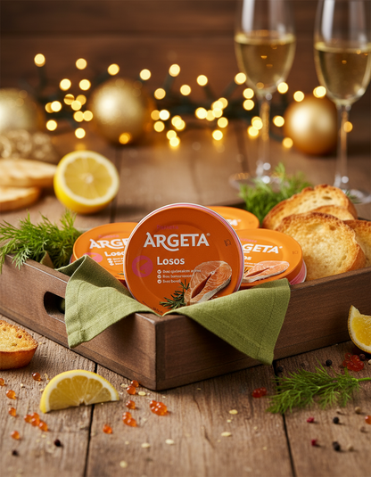 Argeta losos packaging on a wooden tray with lemons and bread, blurred lights in the background
