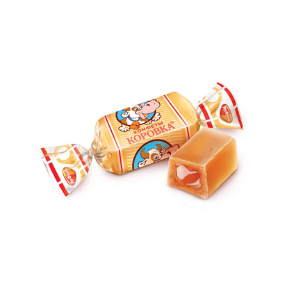 Caramel candy with a colorful wrapper on a white background